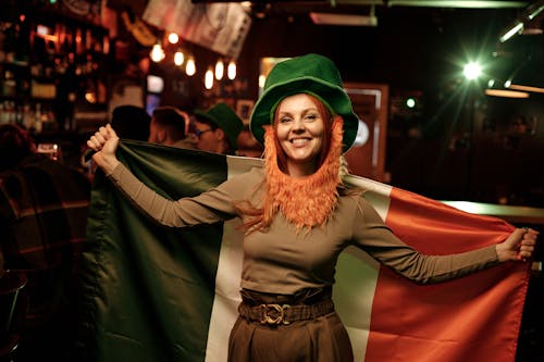 Woman Holding a Flag inside the Bar