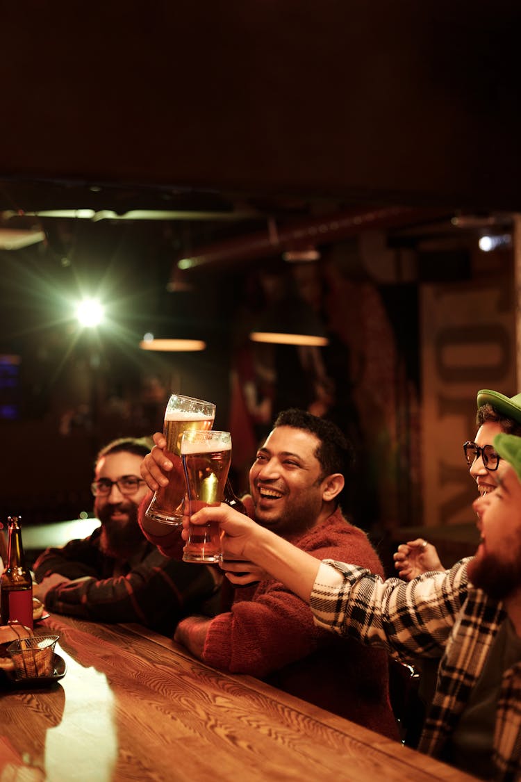 People Celebrating Saint Patrick's Day In The Bar