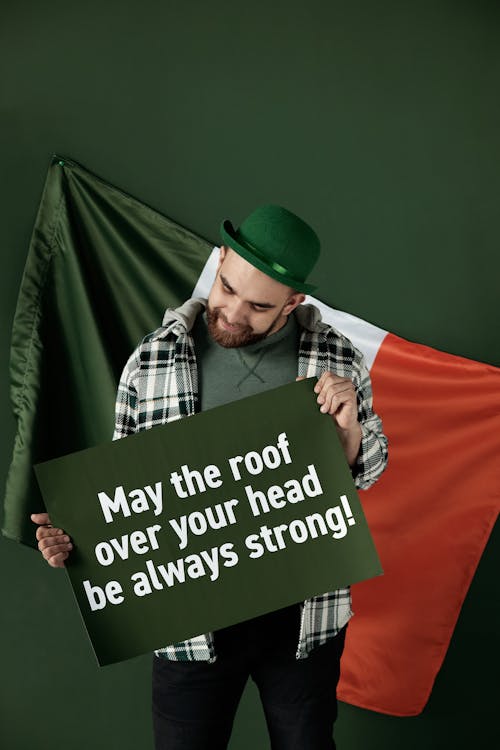 Man Holding a Placard for Saint Patrick's Day