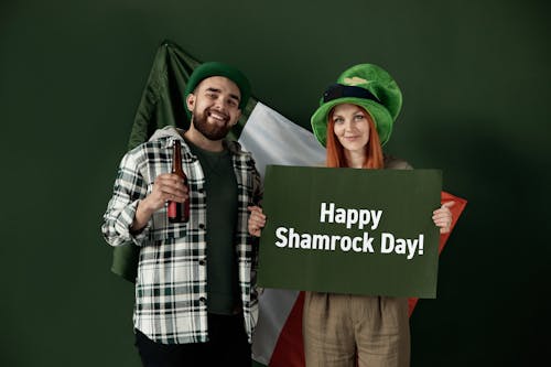 Man in Green and White Plaid Dress Shirt and Green Hat