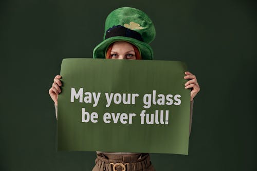 Free Woman Holding a Placard for Saint Patrick's Day Stock Photo