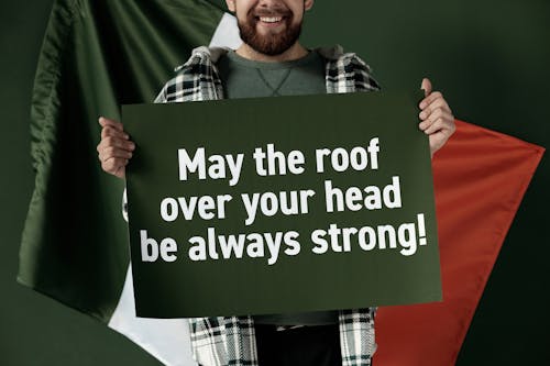 Man Holding a Placard for Saint Patrick's Day