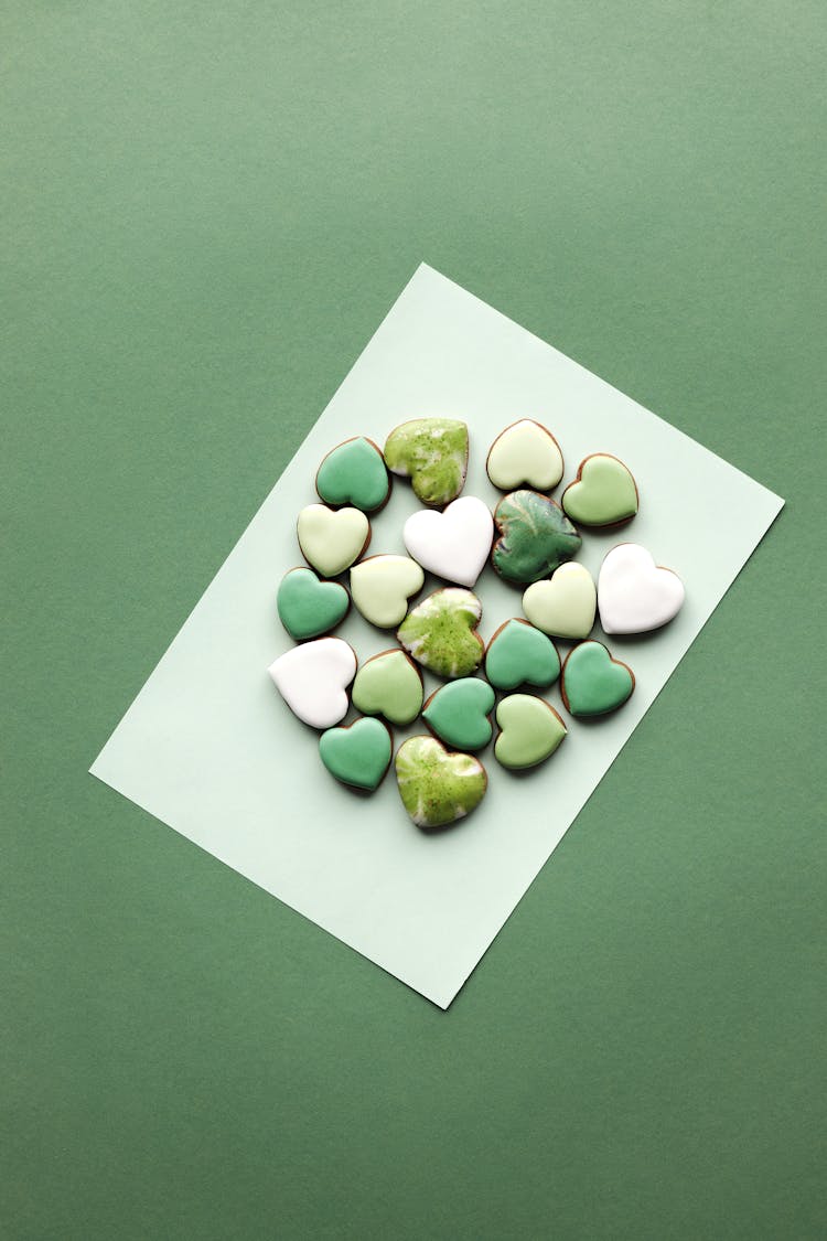 Heart Shaped Cookies With Green And White Icing