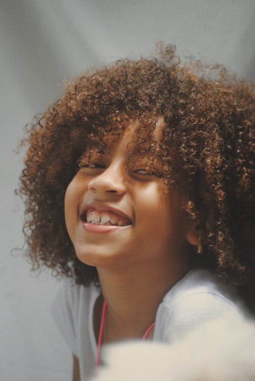 Close-Up Phot of Girl With Curly Hair