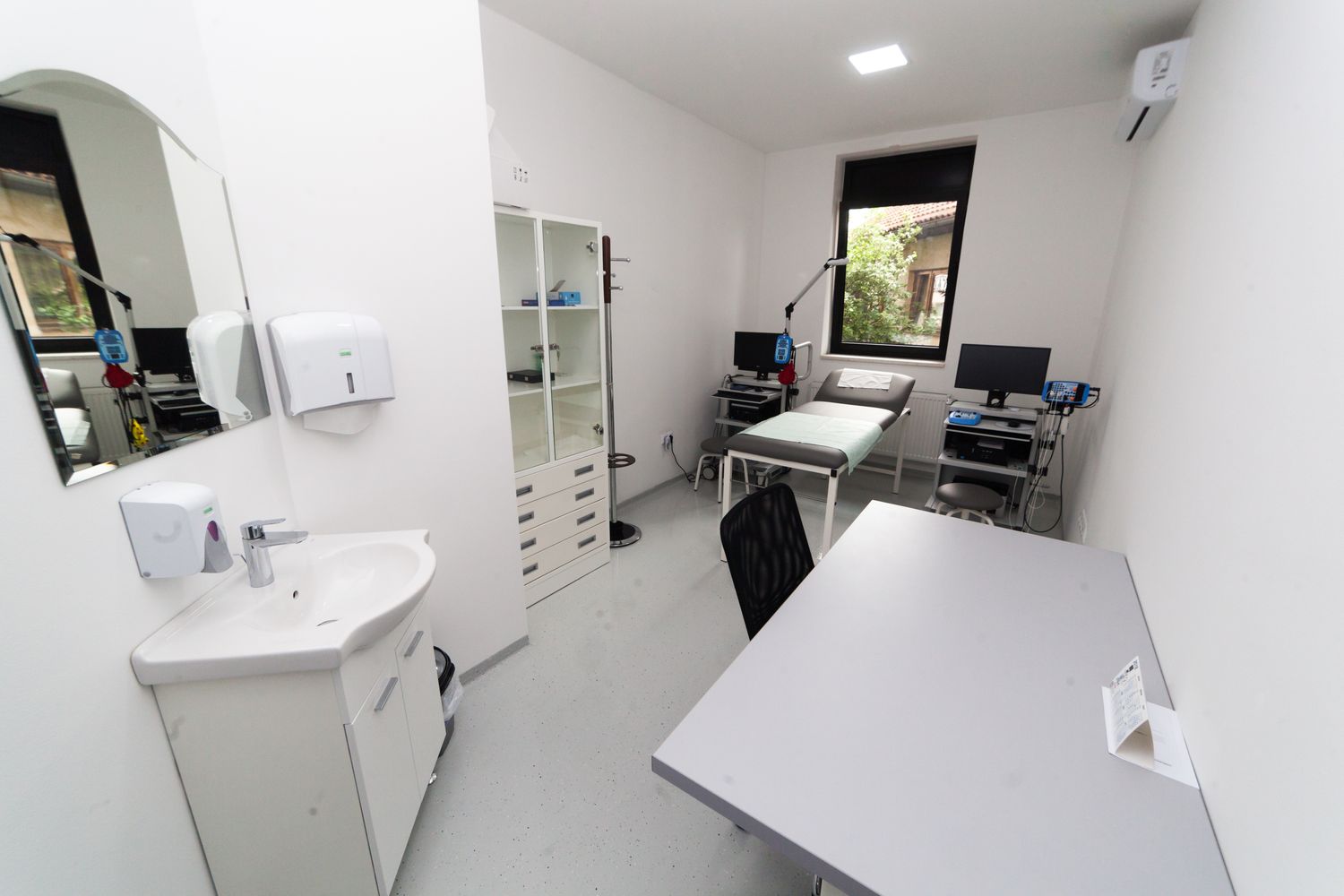 Modern clinic interior with diagnostic tools and warm furniture