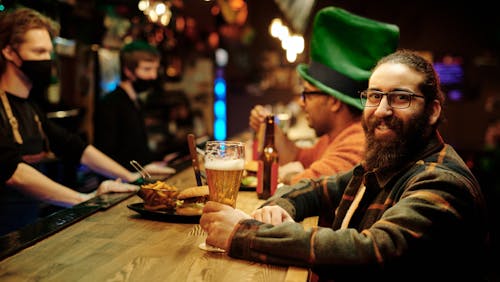 Man in Black Eyeglasses holding a Beer Glass