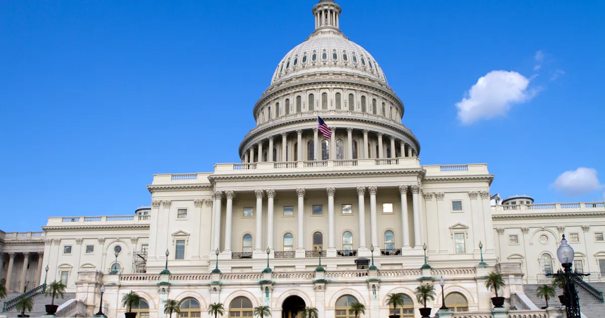 The US Capitol facade against a bright blue sky, representing compliance team action items