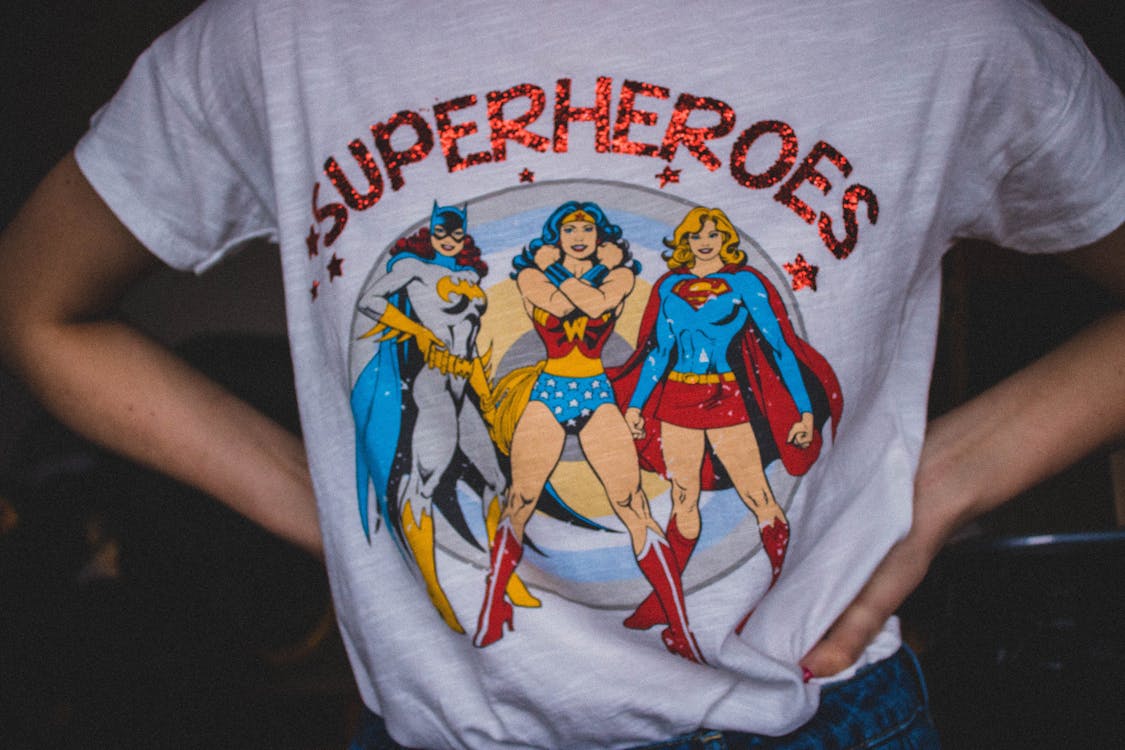 Free Person Wearing Superheroes Printed T-shirt Stock Photo