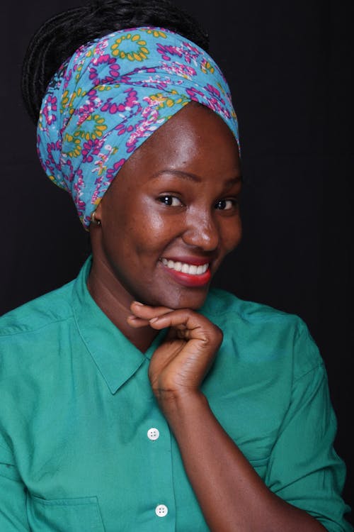 Portrait of a Woman with a Headwrap Smiling