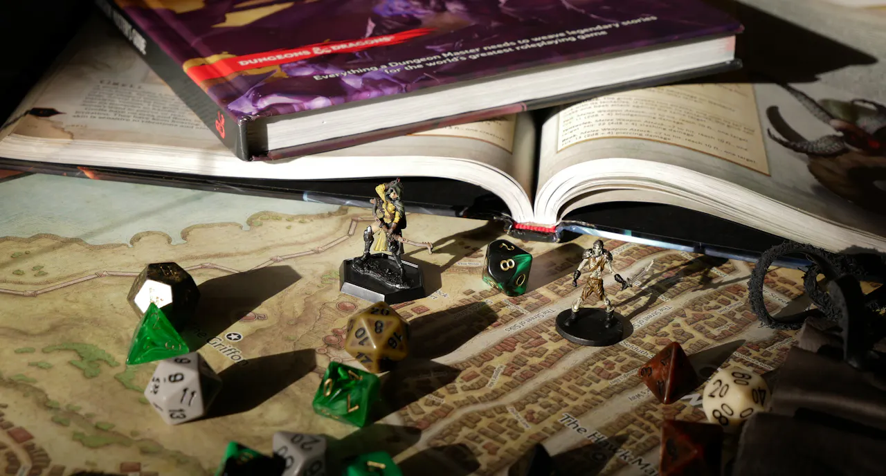 Miniatures and dice on a fantasy map