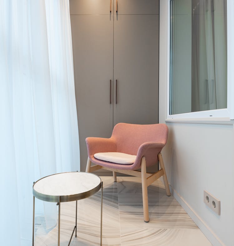 Armchair And Table On Balcony At Home