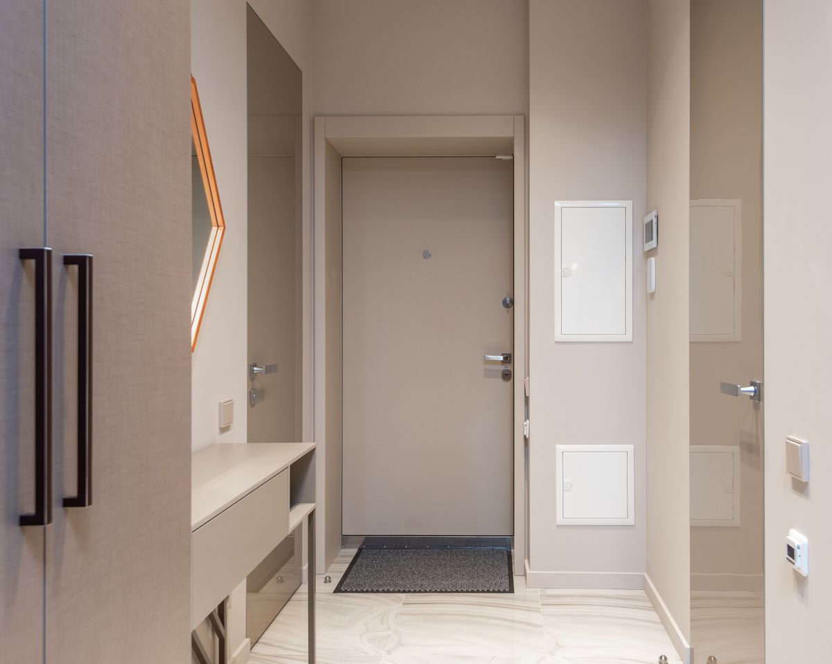 Narrow hallway entrance cabinet with shallow storage planning