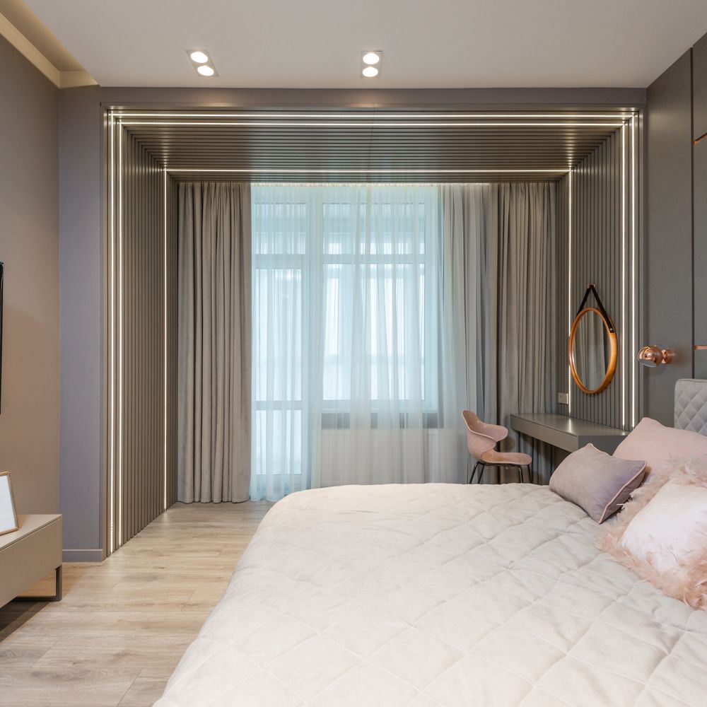 Wallpapering in Southall — dust sheets down and the room fully protected