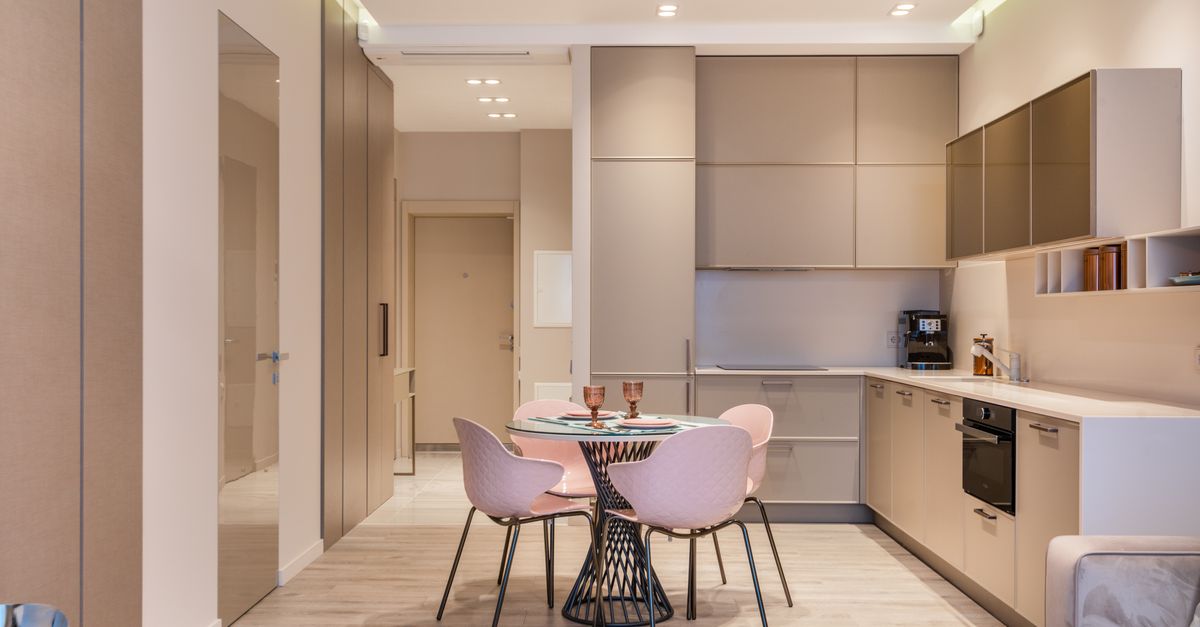 Stylish kitchen interior and set dining table · Free Stock Photo