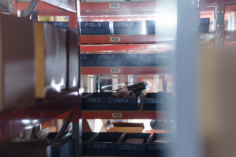 Labeled Shelves In A Warehouse