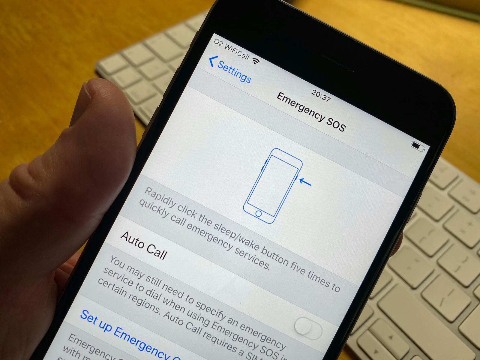 Couple washing dishes together in a home kitchen