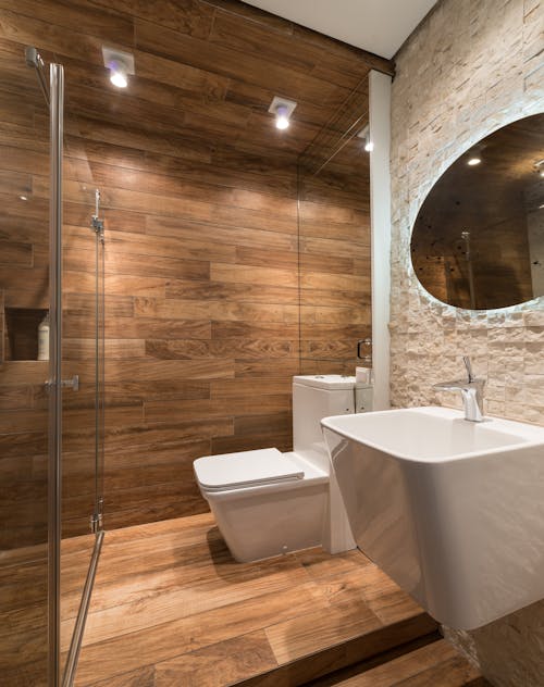 Contemporary washroom with creative sink and mirror