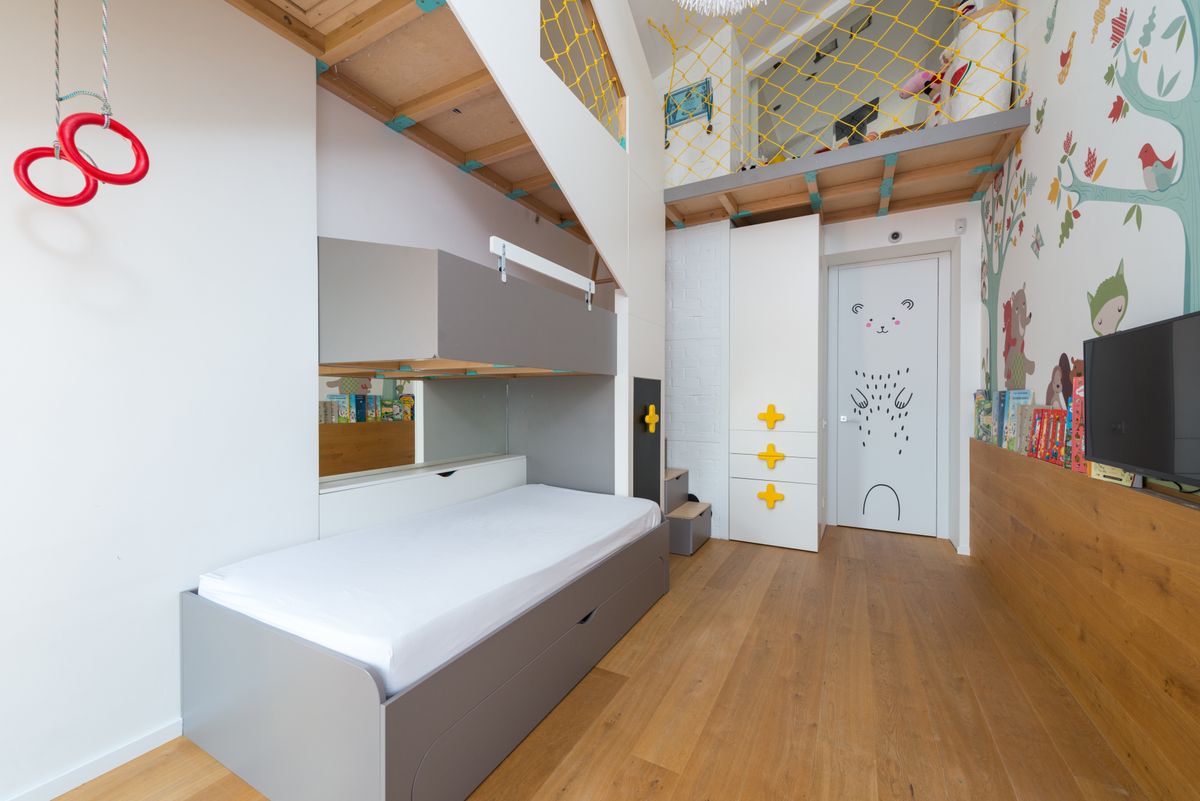 Kids room with bunk bed and storage