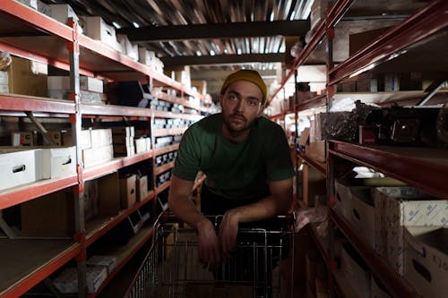 A Man Inside a Warehouse