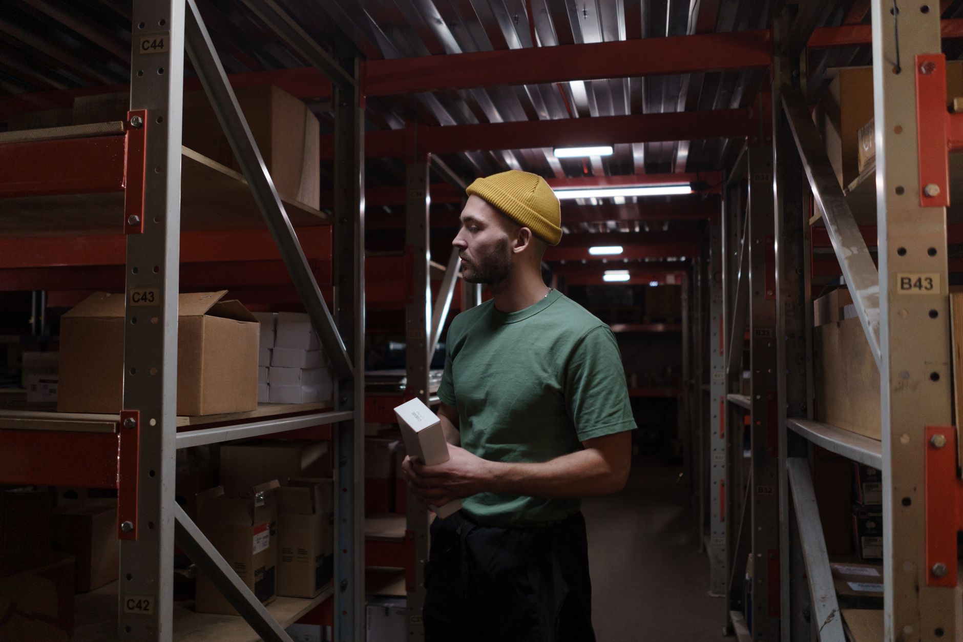 Warehouse Worker Packing Box