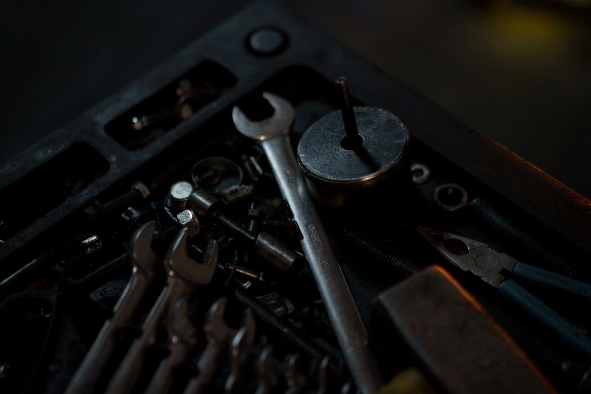 Assorted screws and mechanical tools