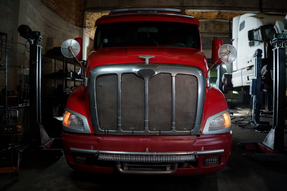 Truck parked in an industrial garage setting