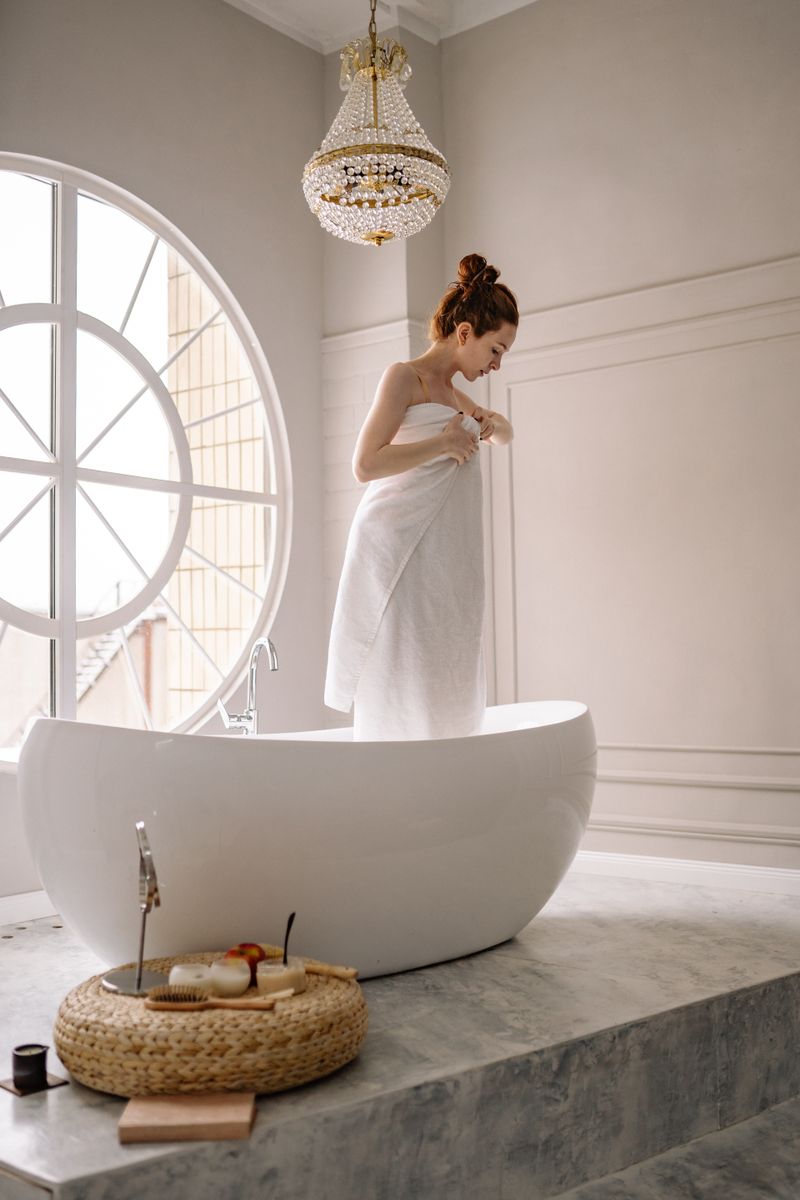 Modern bathroom with bathtub and glass shower