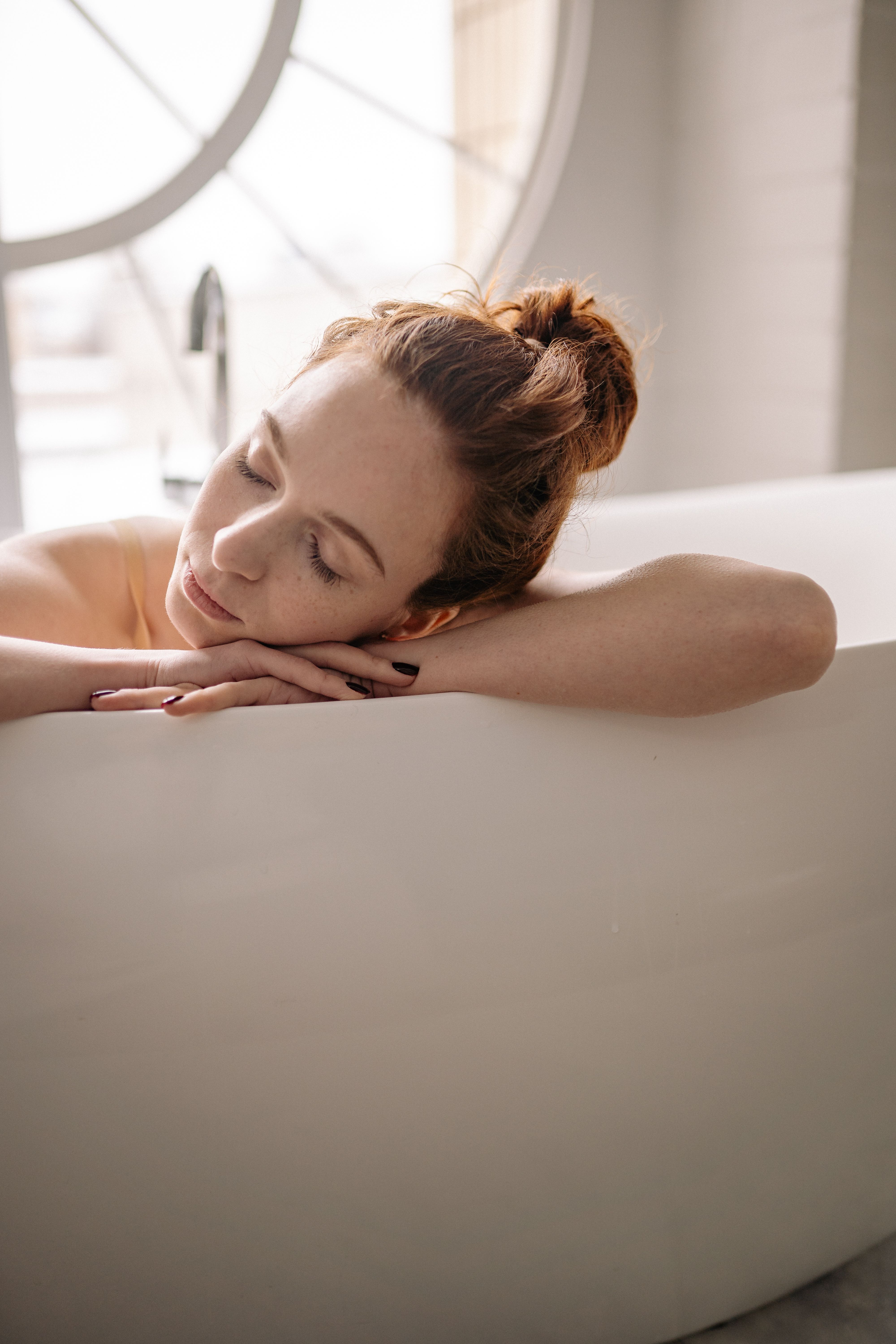 A Woman in Brown Bathing Suit Relaxing inside the Sauna · Free Stock Photo