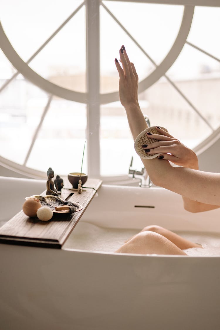 Woman Scrubbing Her Arm