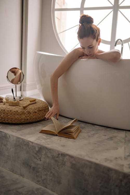 Free Woman in a Tub Stock Photo