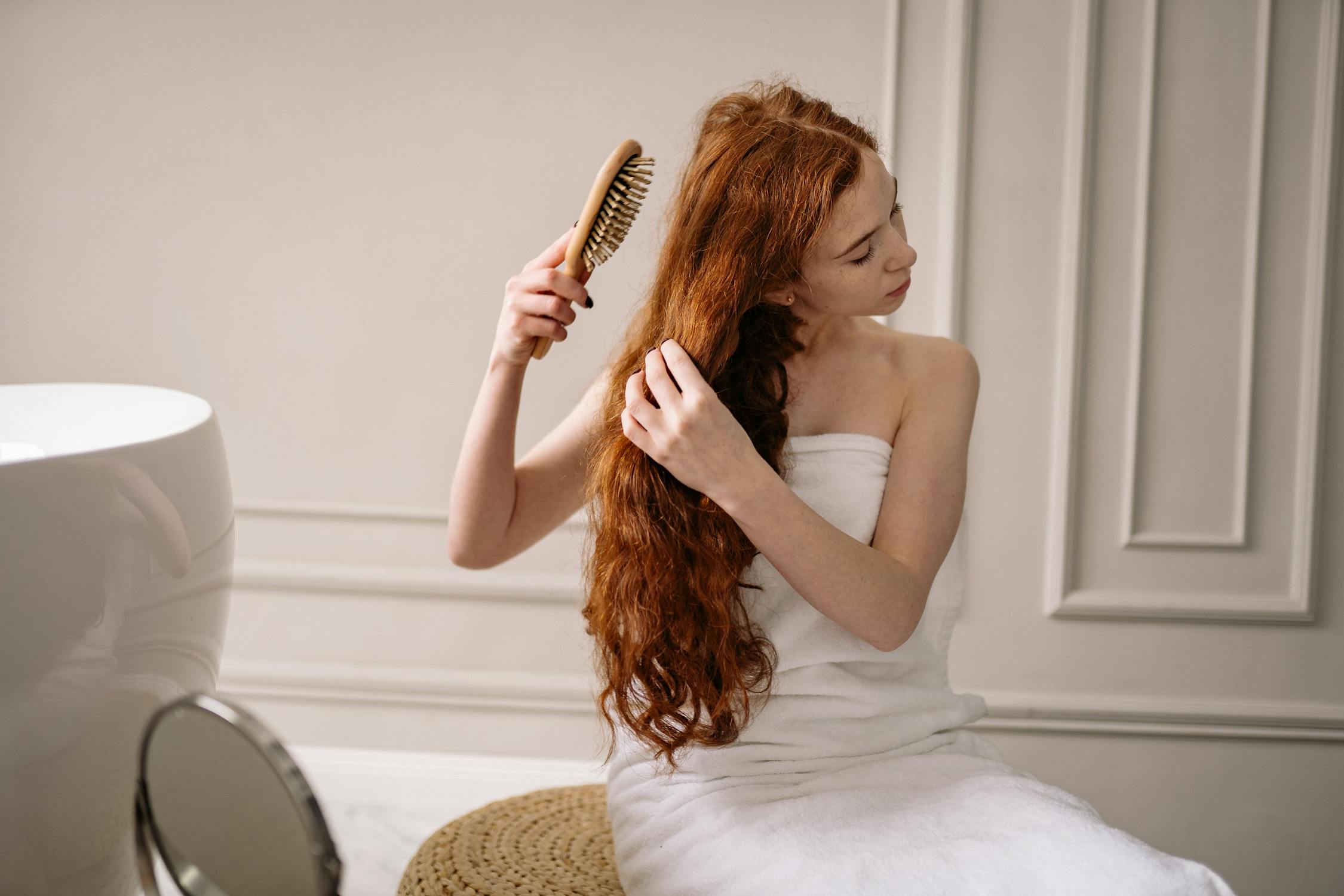 a lady brushing her hair