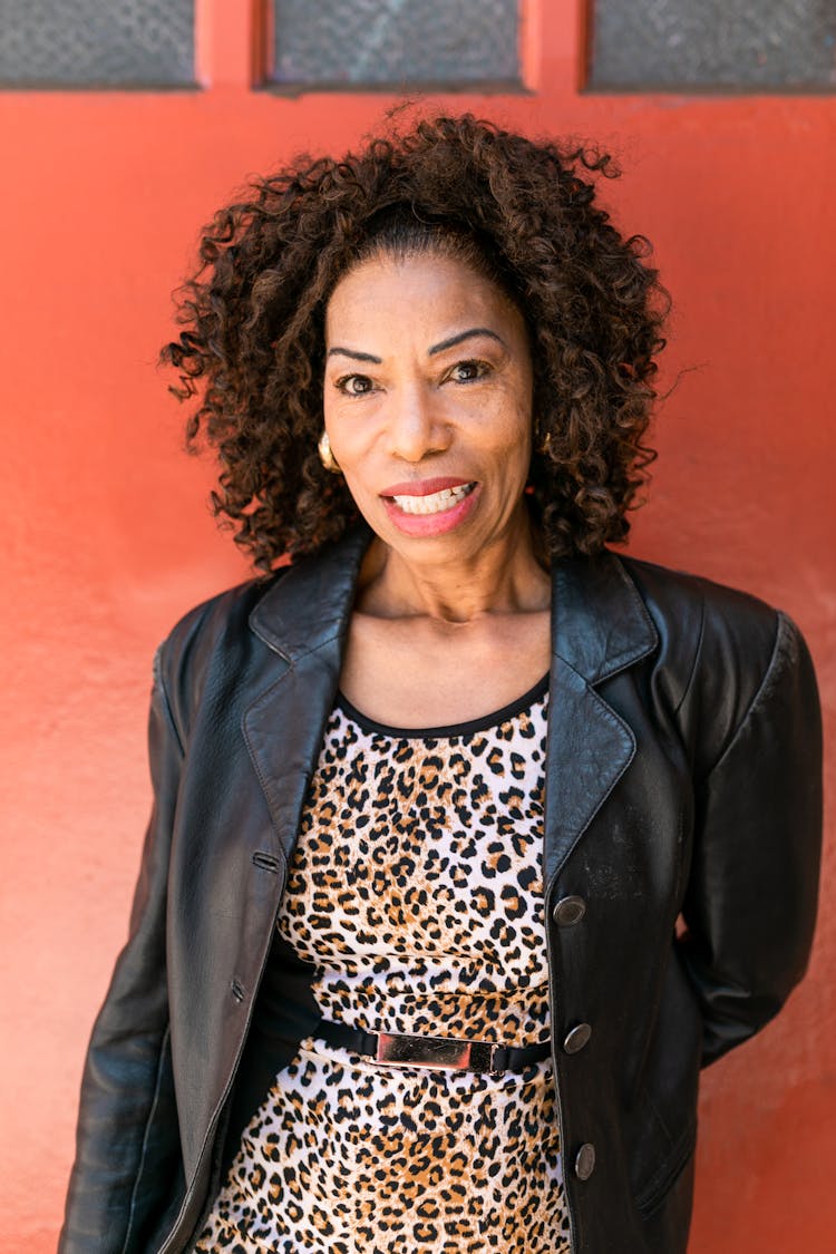 Woman In Black Leather Jacket Smiling