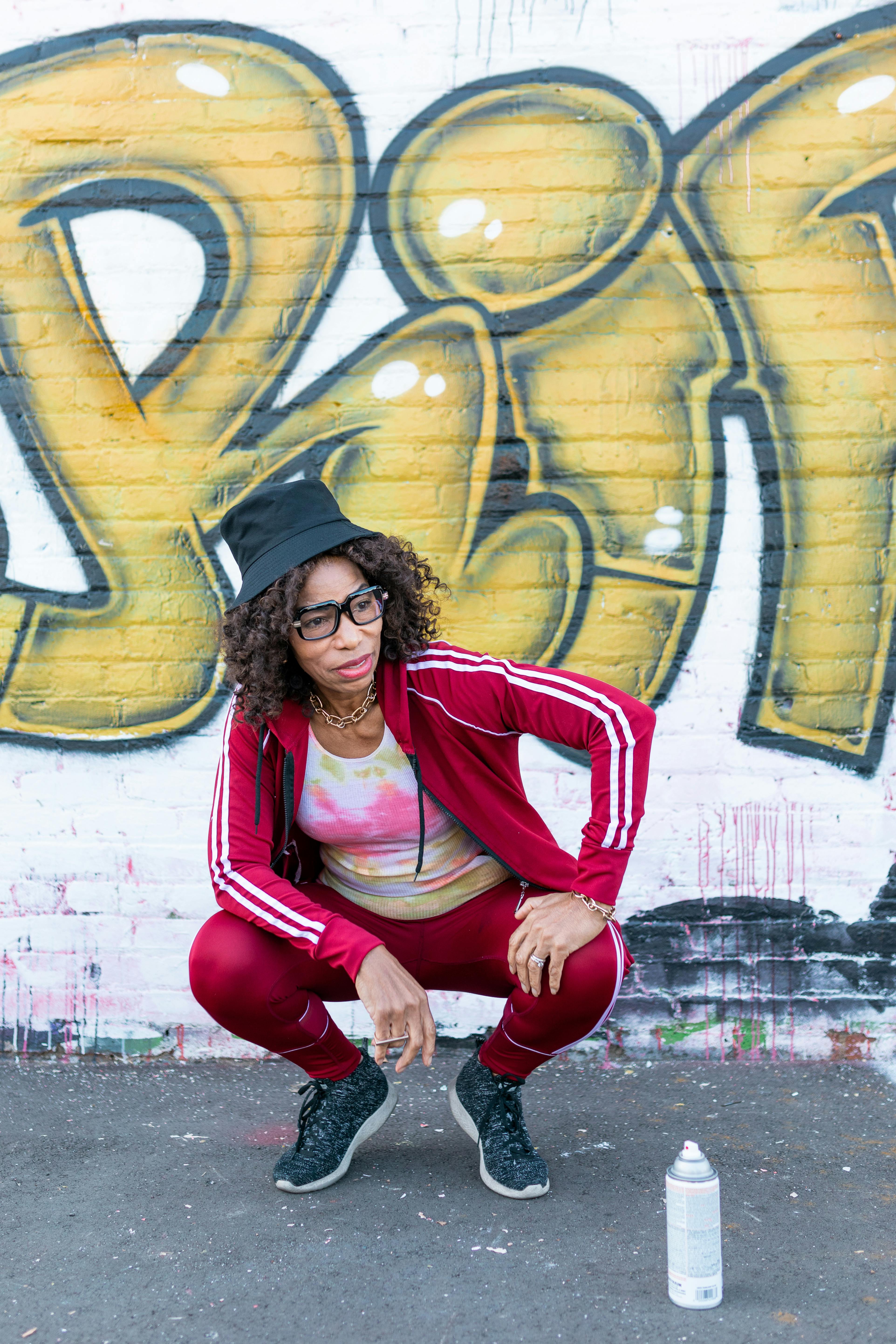 woman in red and white active wear