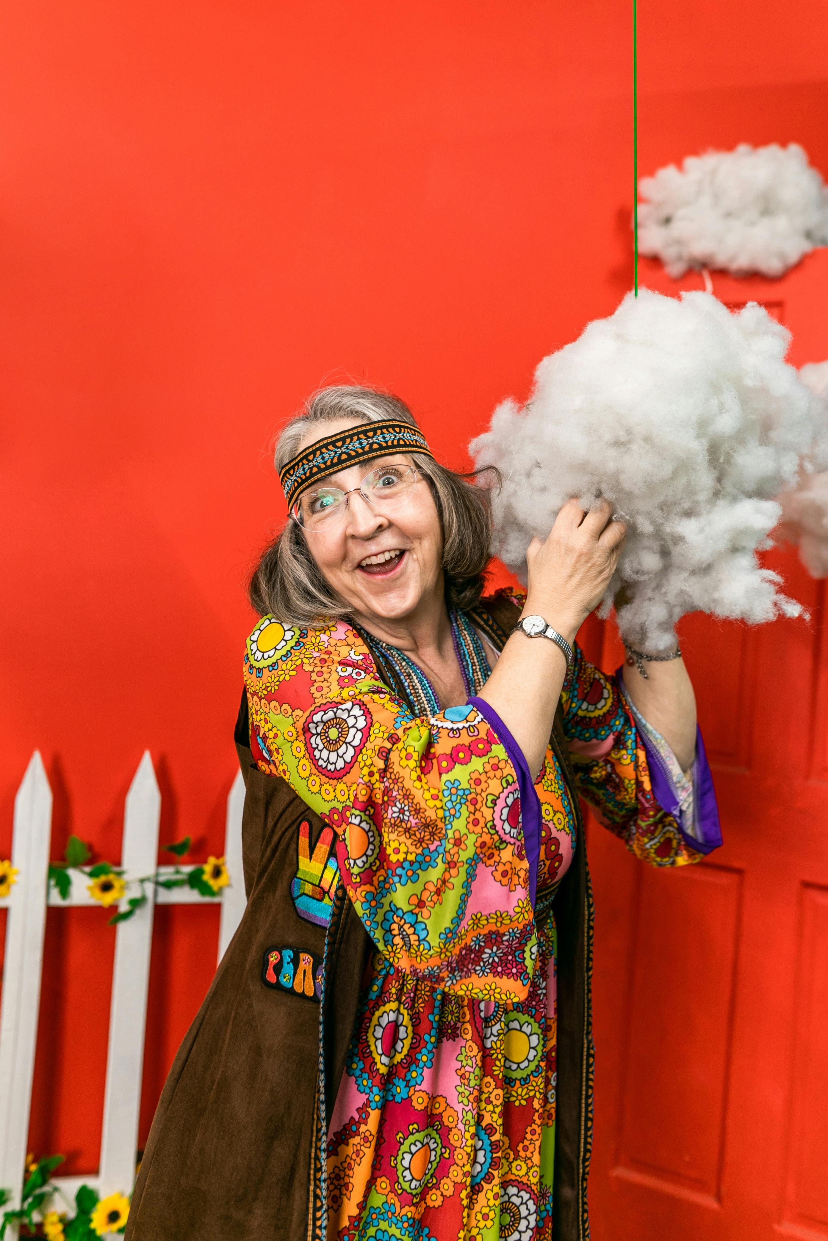 woman holding a cloud decor