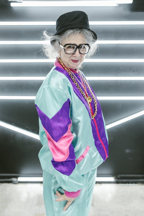 Woman Wearing Black Hat And Colorful Jacket