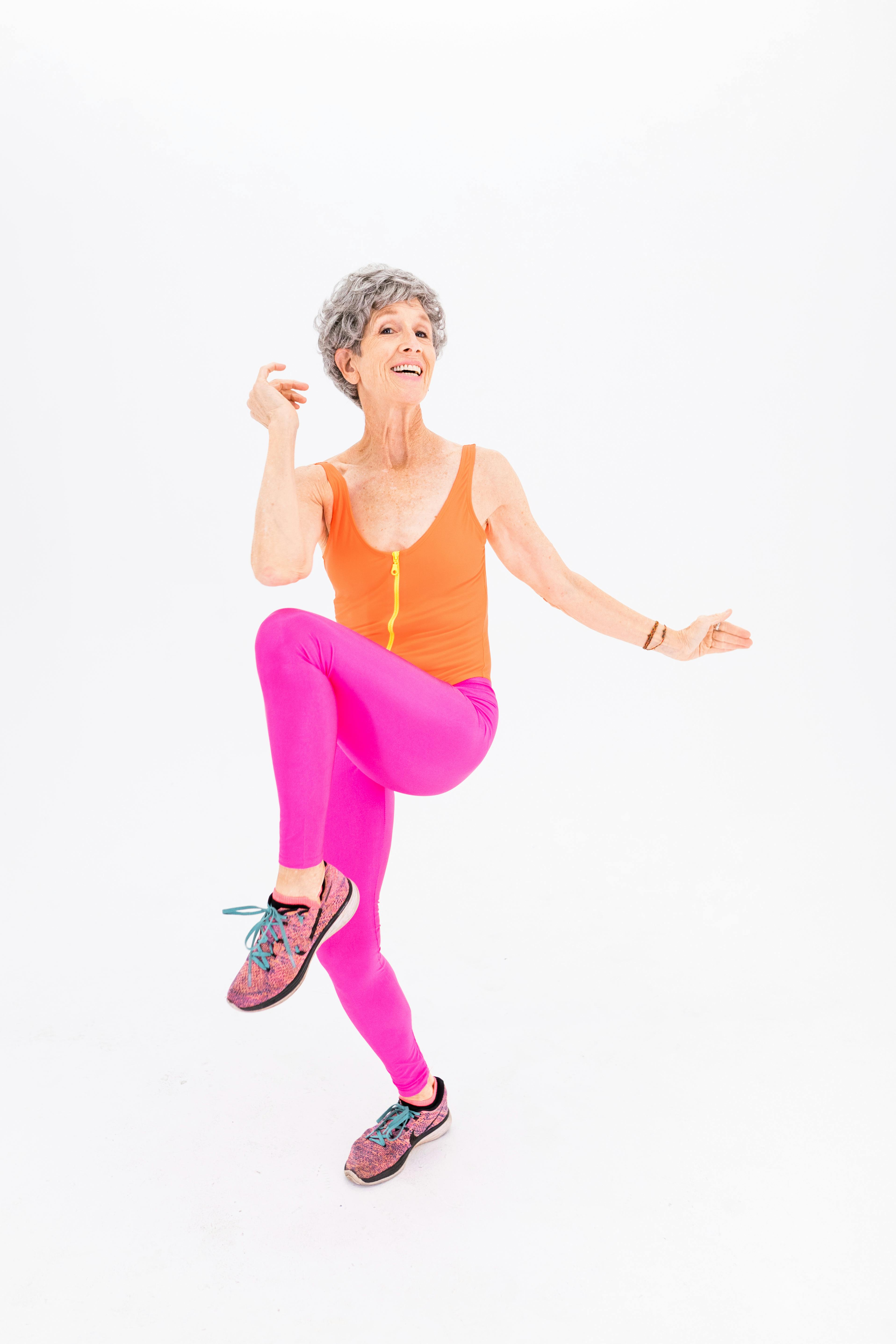 Woman in Pink Tank Top and Pink Leggings · Free Stock Photo