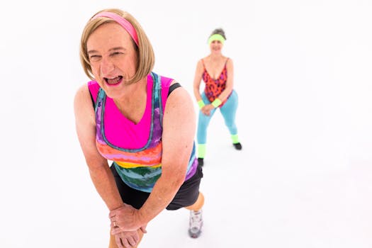 Lively and colorful exercise session showcasing senior women in activewear maintaining fitness and joy.