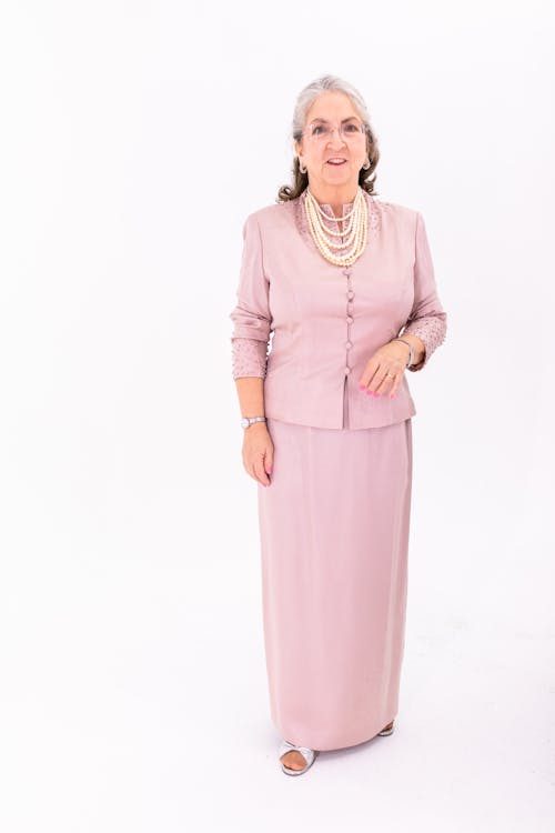 Elderly Woman in Pink Long Sleeve Dress