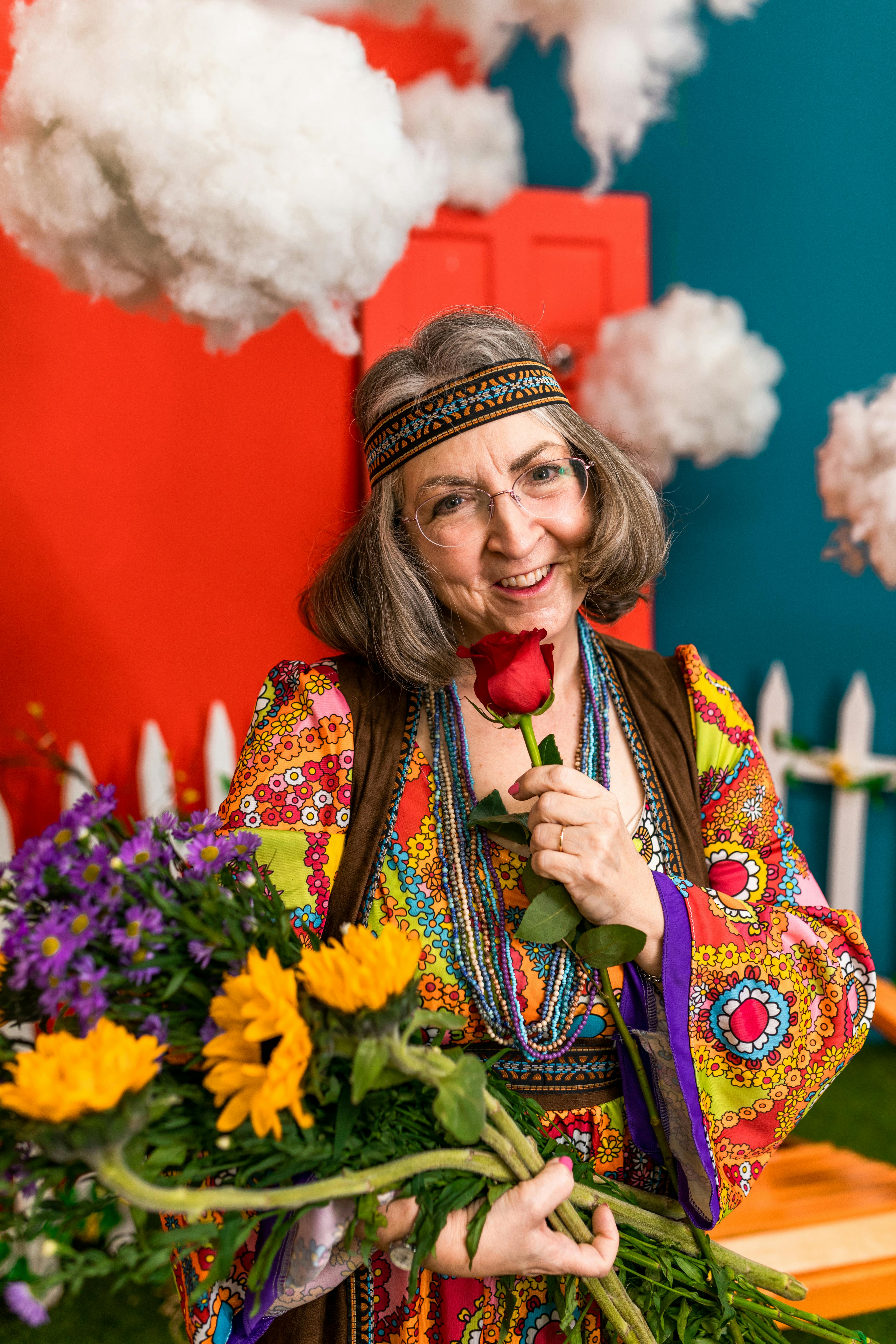 woman holding a bunch of flowers