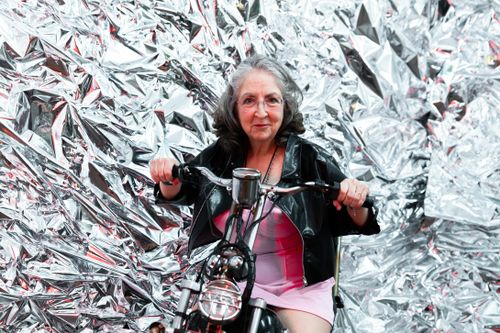 Woman in Pink Dress Riding on a Motorcycle · Free Stock Photo