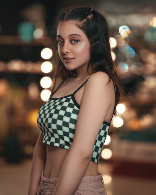 Woman in Checkered Crop Top