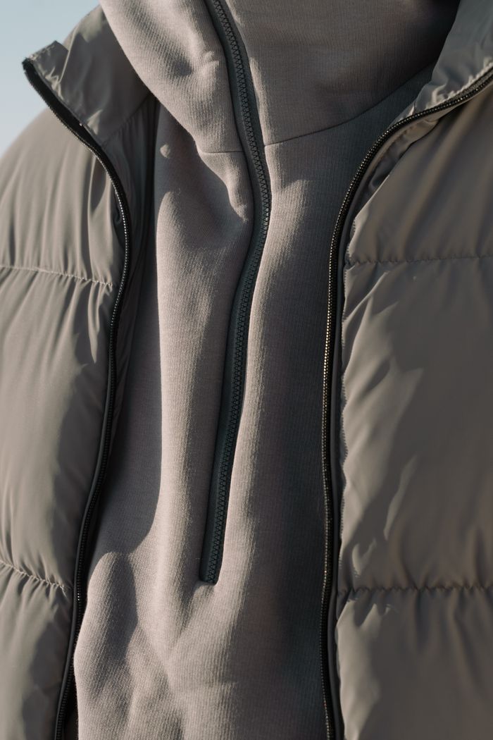 Olive quilted down jacket, photo by cottonbro studio on Pexels