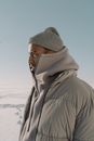 Man in Gray Knit Cap and Gray Jacket