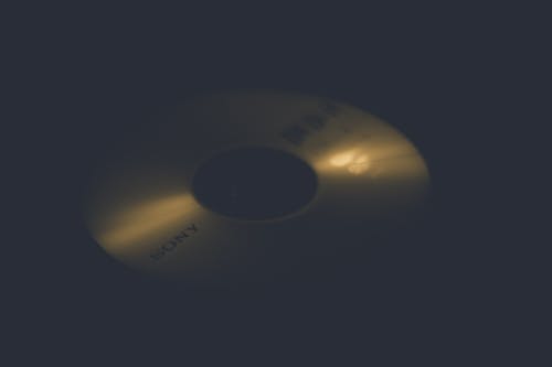 Free stock photo of black background, candlelight, disc