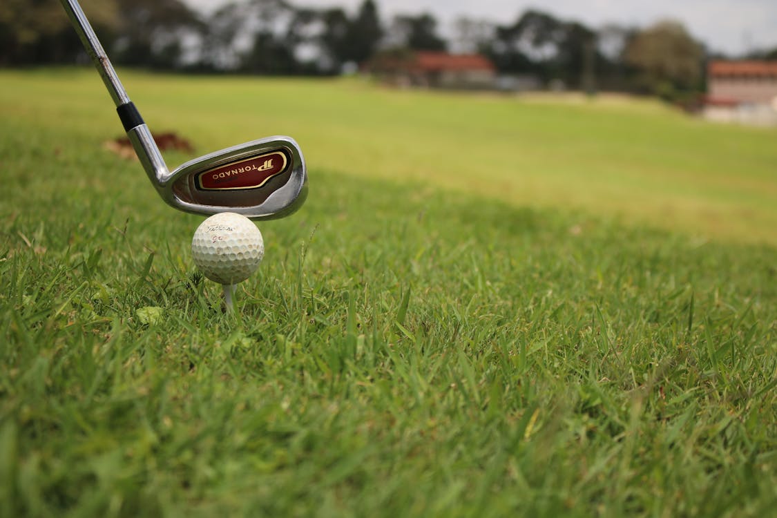 Free stock photo of golf ball and club