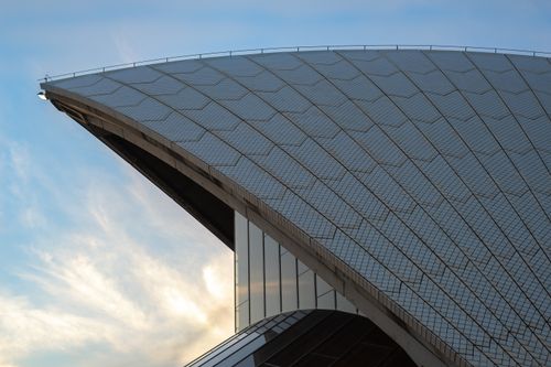 Free Close-up view of the Sydney Opera House roof against a clear sky, showcasing modern architectural design. Stock Photo