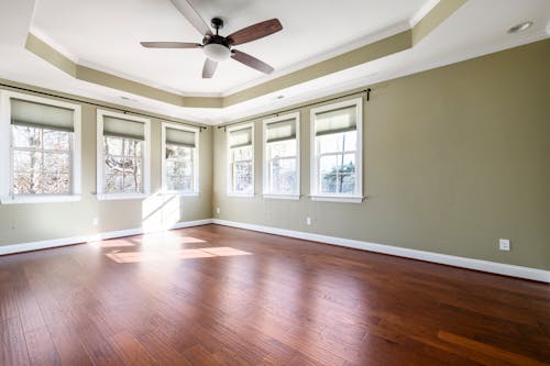 Wooden Floor Room with Ceiling Fan