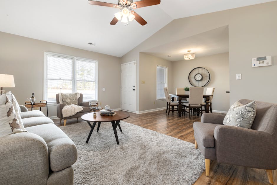 Bookshelf vs Floor Seating: A Simplified Guide to Choosing the Best Space-Saving Solution for Tiny Apartments Minimalist living space with floor seating and open area