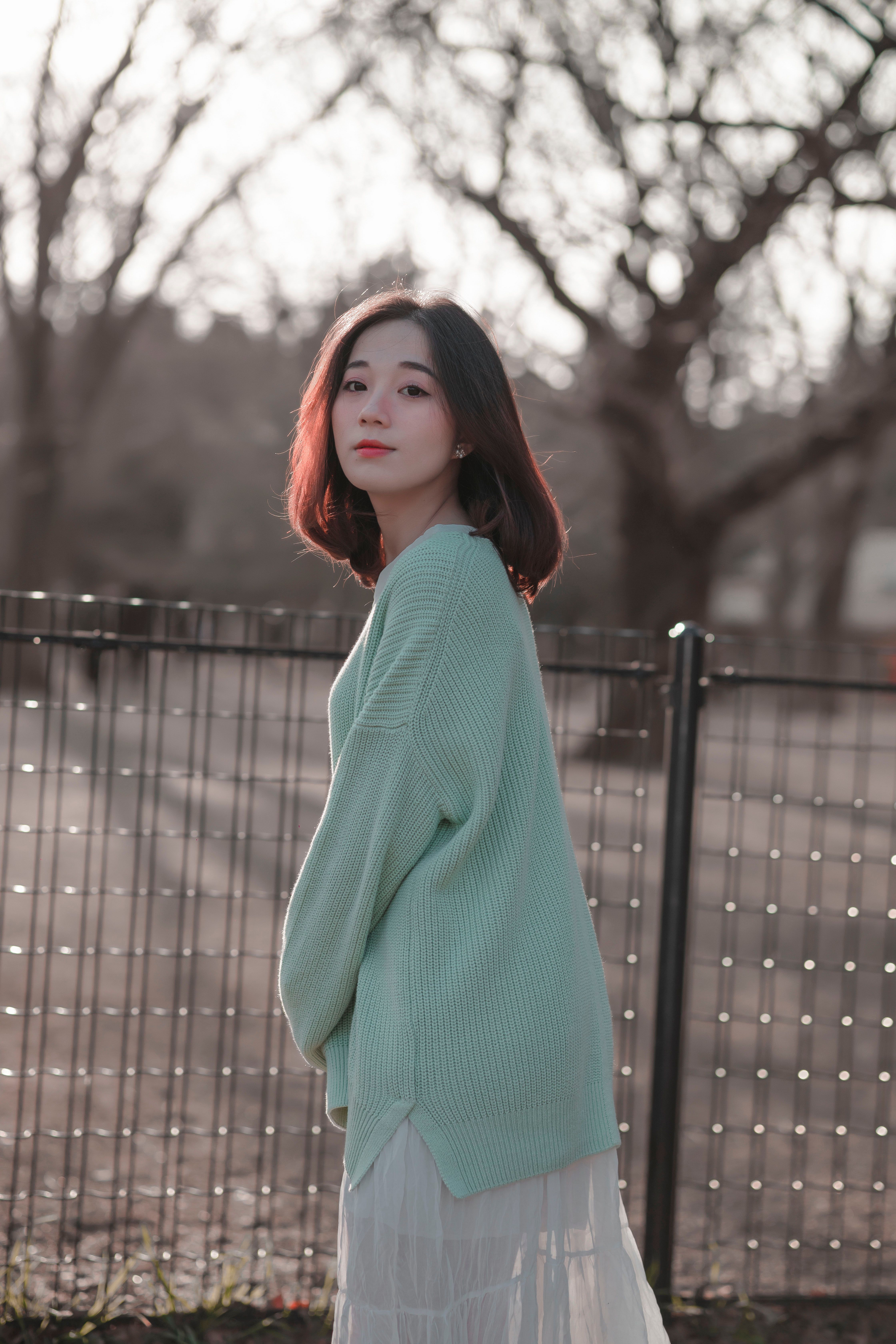 Beautiful Woman in a Knitted Sweater · Free Stock Photo