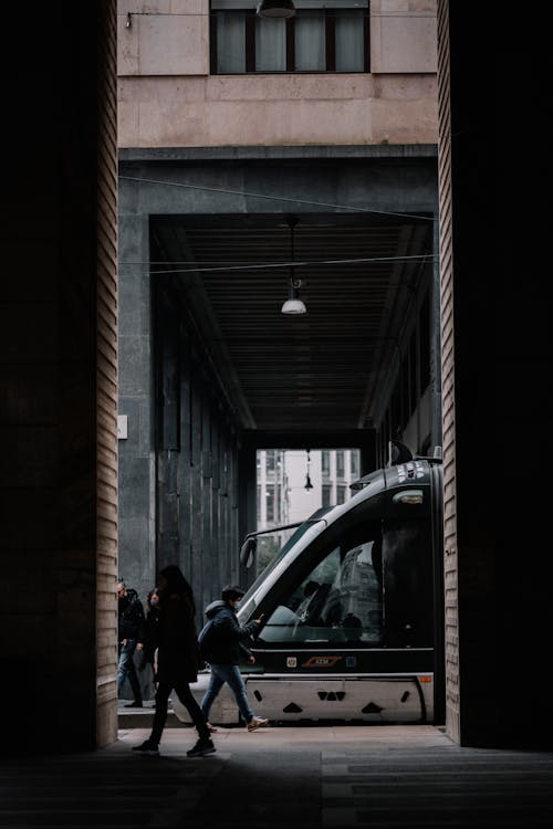 People in a Building near the Train